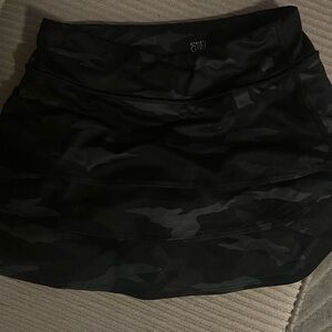 Althleta Girl camo skirt with built in shorts.  Only worn a handful of times.